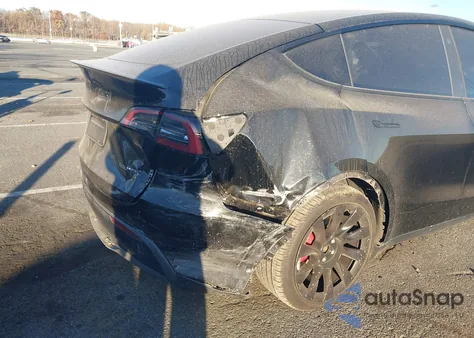 2023 Tesla Model Y from USA, damaged, VIN 7SAYGDEF1PF788899
